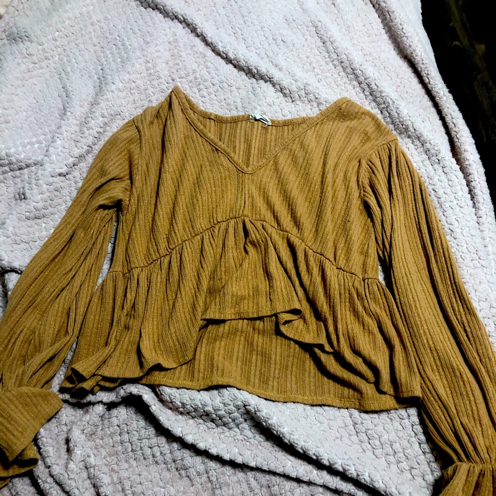 gold sweater
